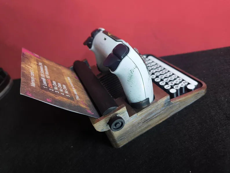 Soporte de mando Resident Evil con maquina de escribir